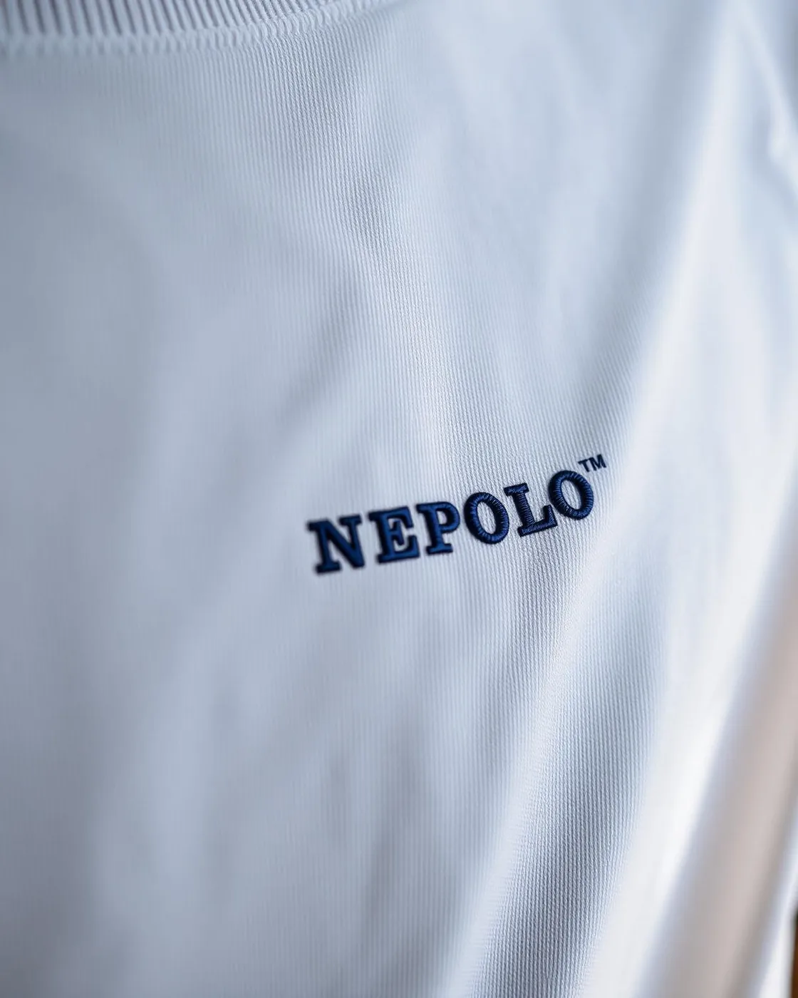 Embroidered Nepolo detail on white
