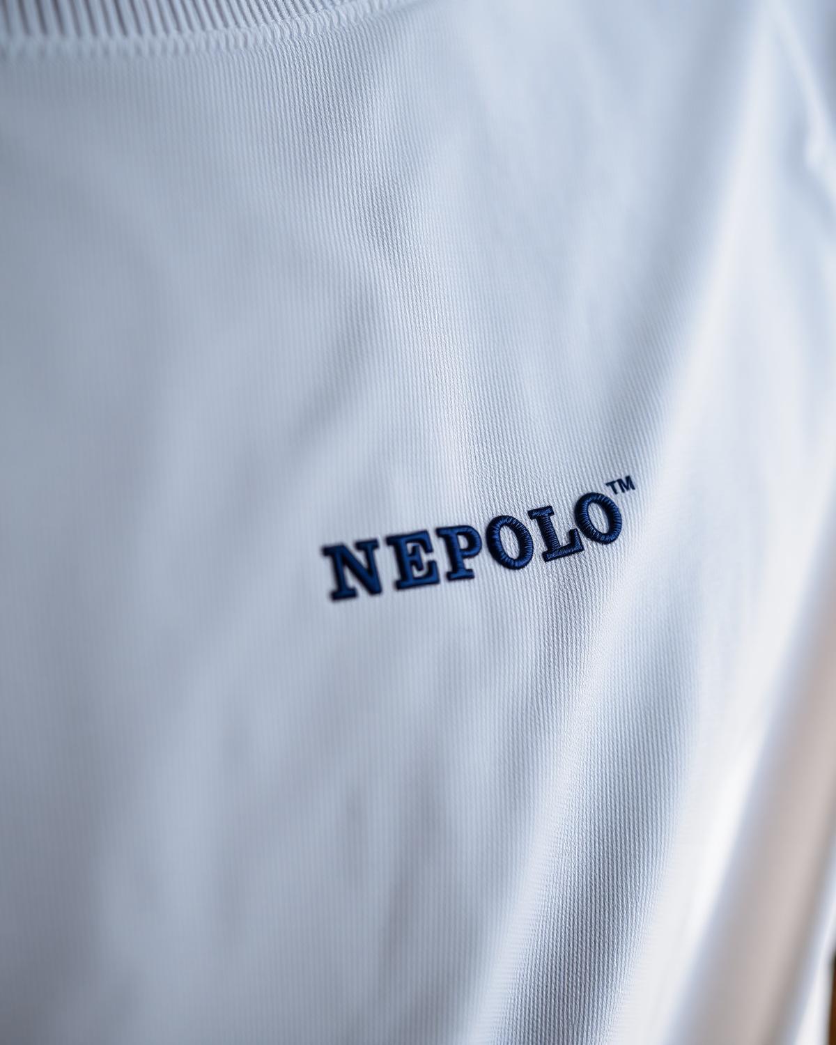 Embroidered Nepolo detail on white