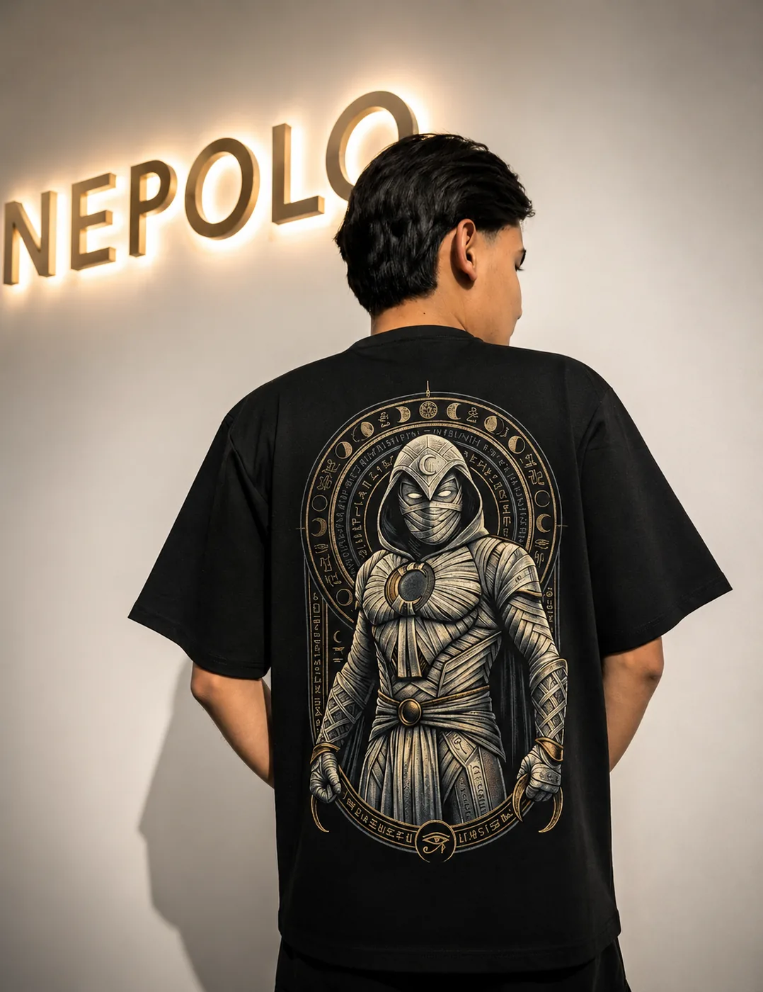 Moon Knight tee back print in front of Nepolo signage